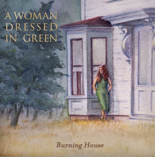 A Woman Dressed In Green Burning House Portada